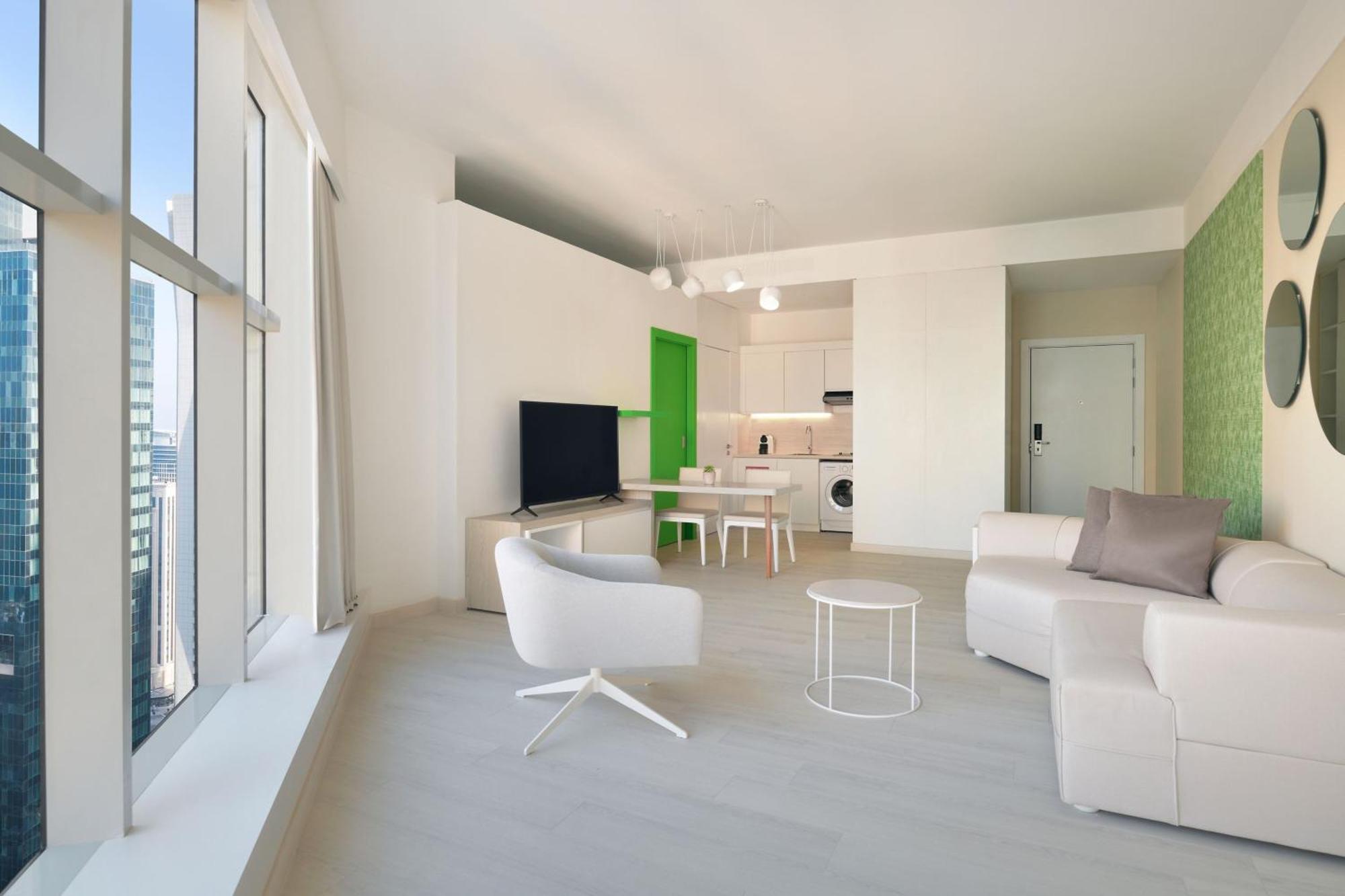 Element By Westin West Bay Doha Hotel Bagian luar foto Interior of a typical apartment