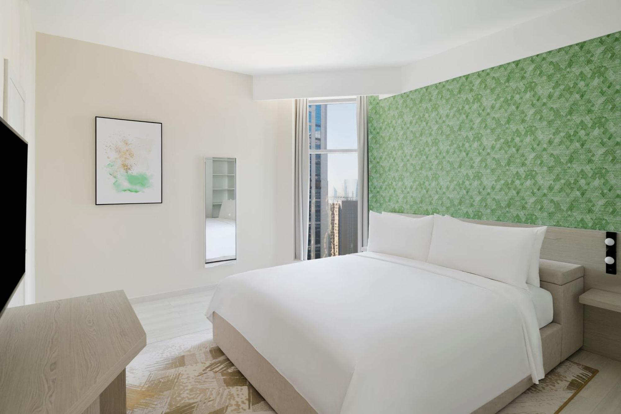 Element By Westin West Bay Doha Hotel Bagian luar foto A bedroom
